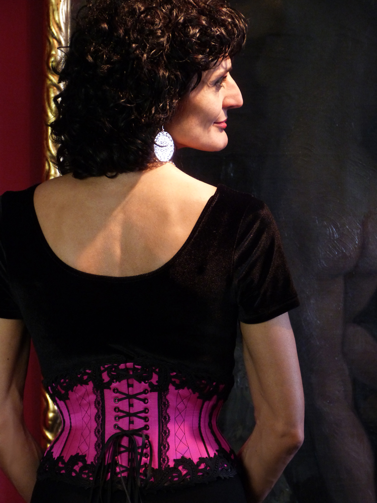 happy client in her "tango waist cincher" made by corset artist Beata Sievi
